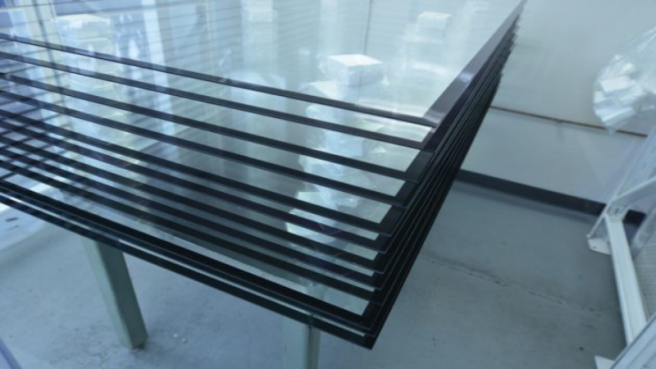 How Do Anti-Reflective Coatings Alter the Properties of Glass Lenses?